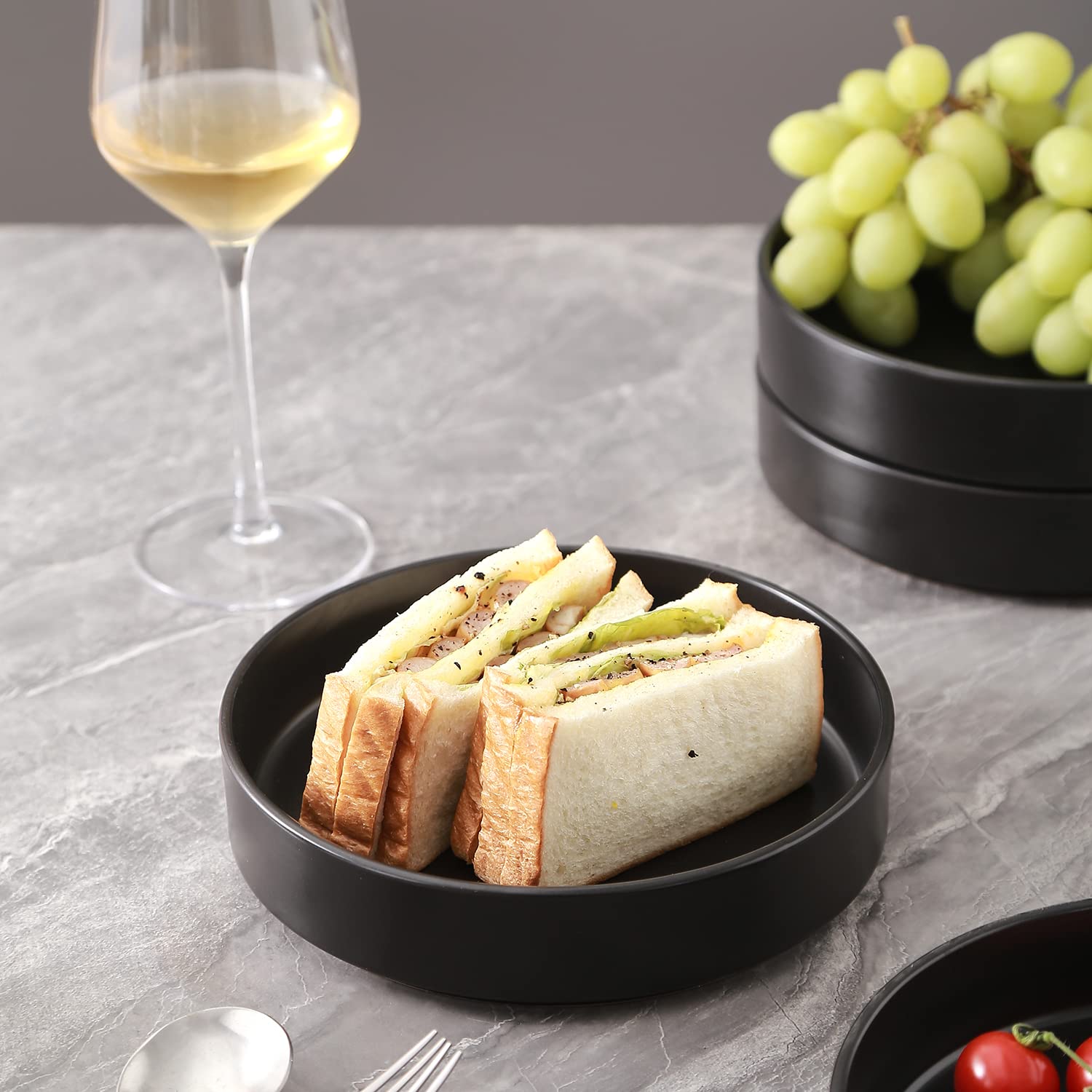 Stone Lain Celina Stoneware 16 Piece Dinnerware Set, Plates and Bowls, Black Matte Dish, Service for 4 – Minimalist Round Style, Microwave & Dishwasher Safe